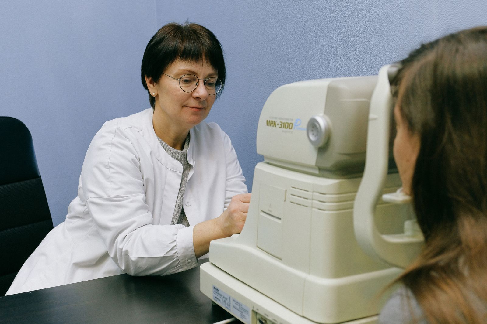 A patient receiving a professional eye examination