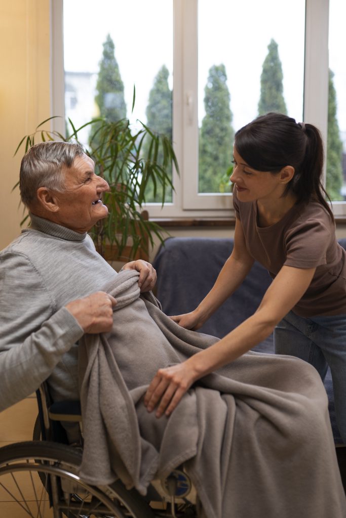 elderly person being taken care by female caretaker ¿Está cubierto Zinplava por Medicare? Una guía completa