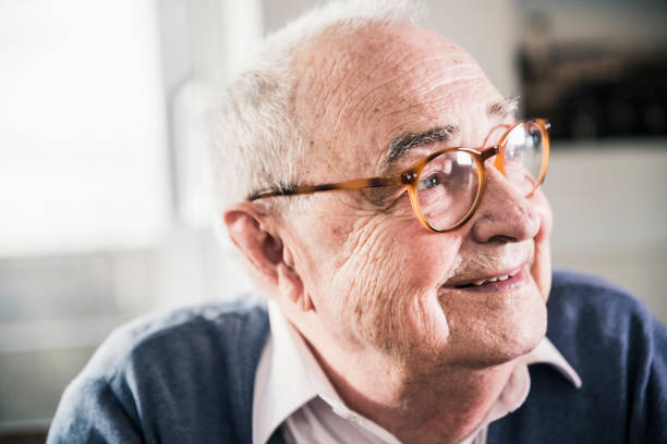 "Smiling elderly man wearing glasses, symbolizing individuals enrolling in Medicare Part B for essential healthcare coverage."

